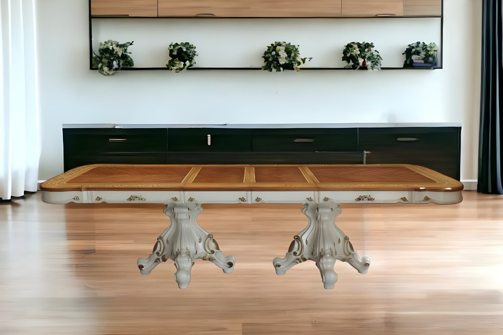 Ornate metal-pedestal dining table with a light wood top in a modern living space.
