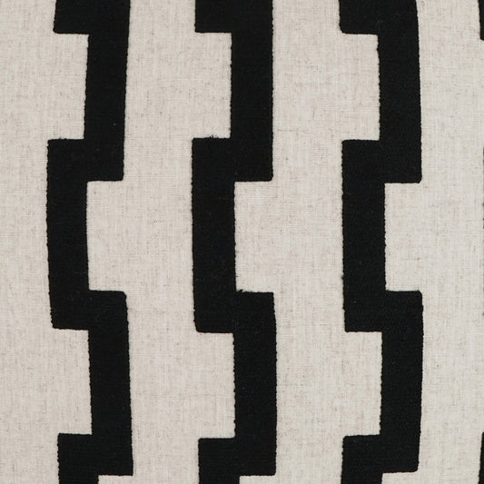 Beige woven fabric featuring a bold black stepped zigzag vertical pattern.