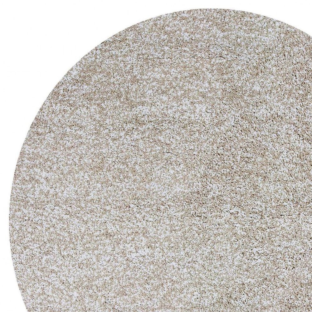 8' Ivory hand-woven round rug.
