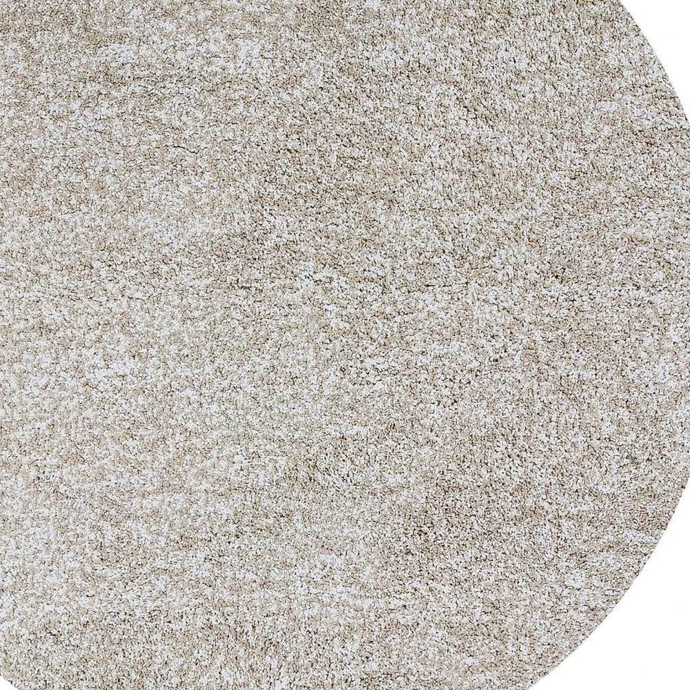 Ivory hand-woven round rug, 8 ft diameter.