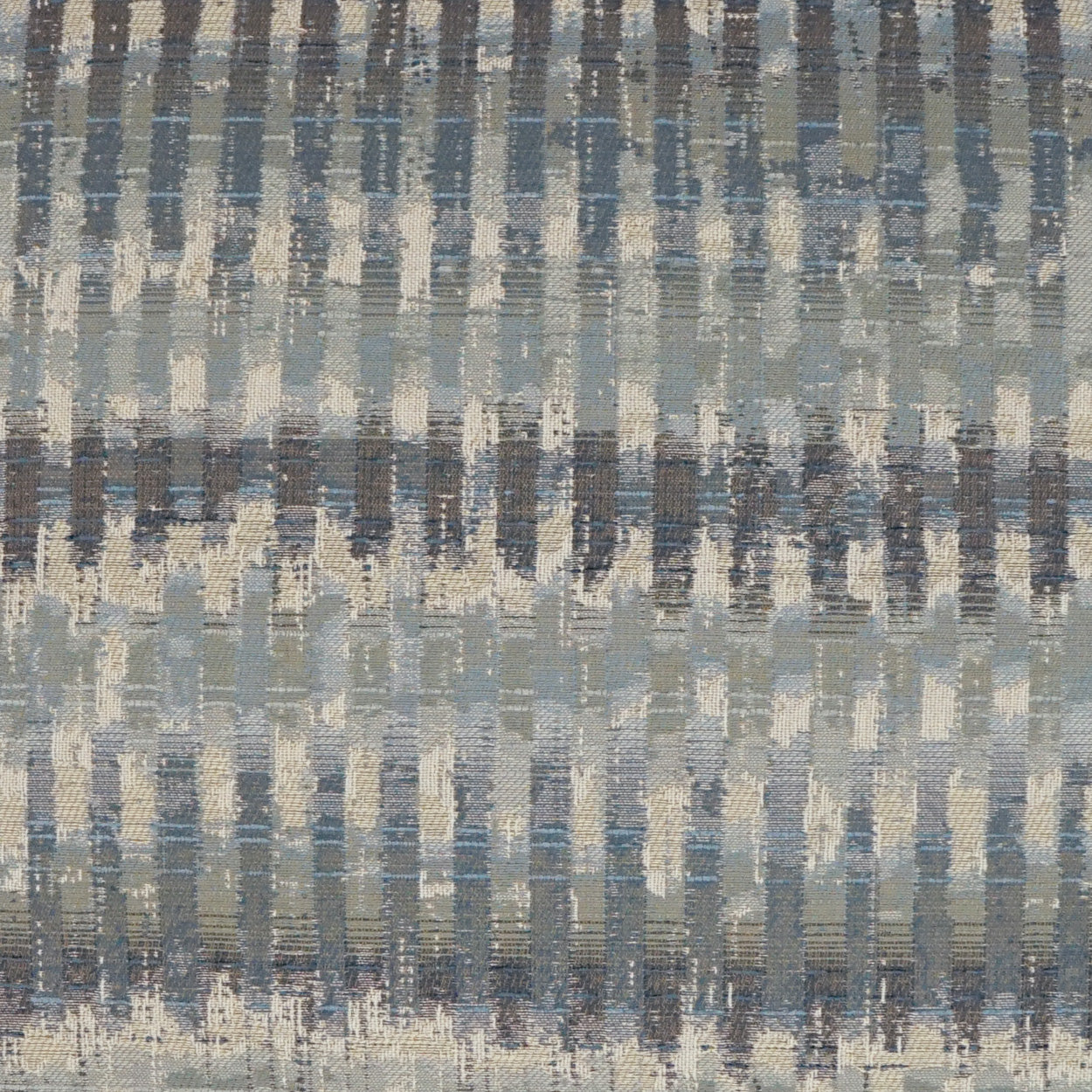 Blue-gray woven fabric with repeating vertical brushstroke stripes; abstract textile texture.