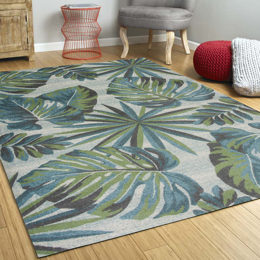 5' X 8' Beige Teal and Green Tropical Botanical Leaves Area Rug