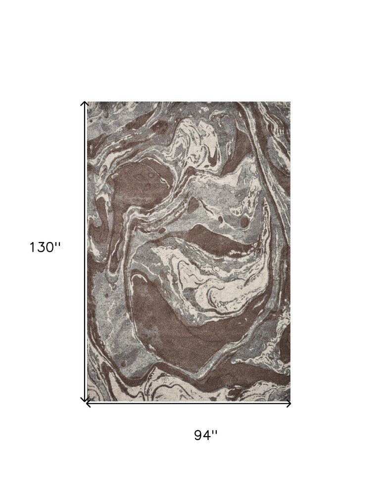 7' X 10' Brown And Ivory Abstract Area Rug