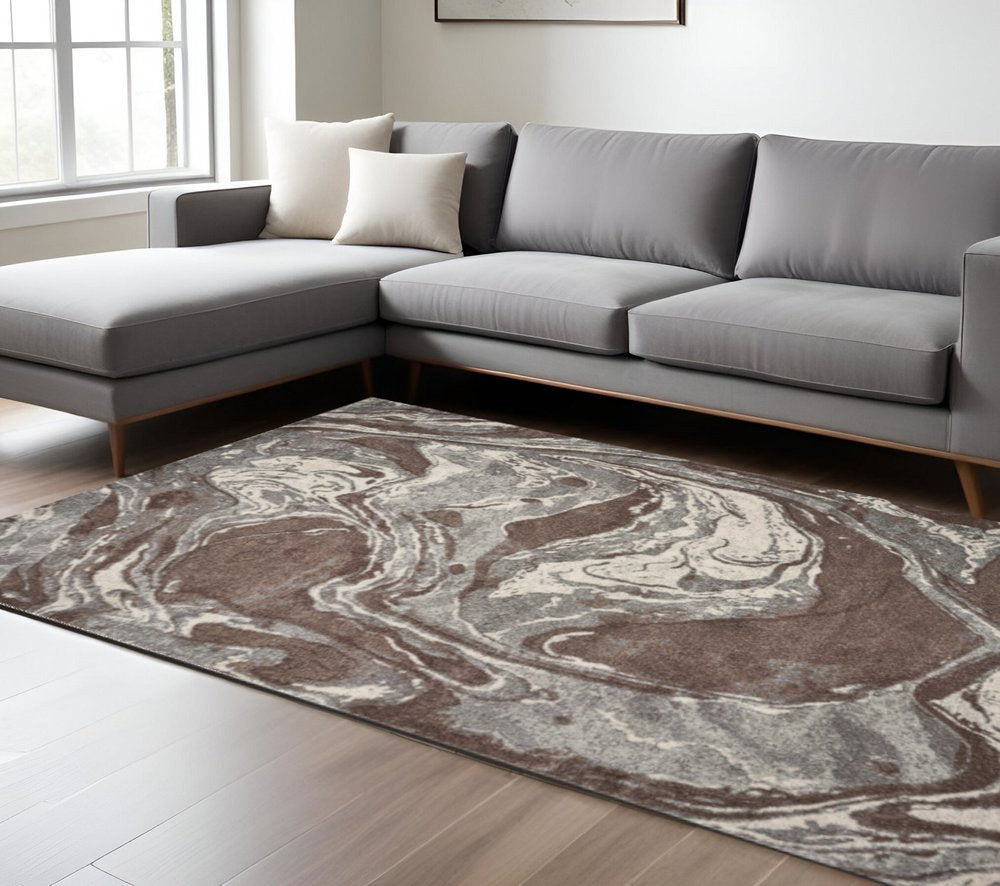 7' X 10' Brown And Ivory Abstract Area Rug