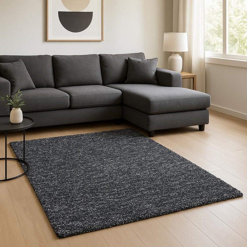 5' X 7' Black And White Shag Hand Woven Area Rug