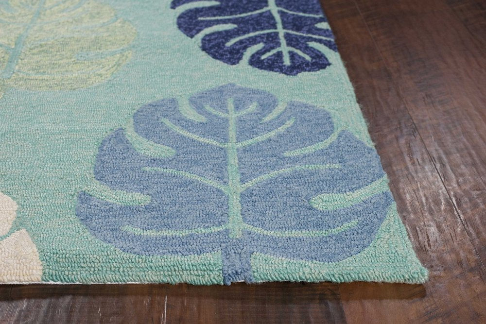 7' X 9' Turquoise And Ivory Botanical Leaves Hand Tufted Area Rug