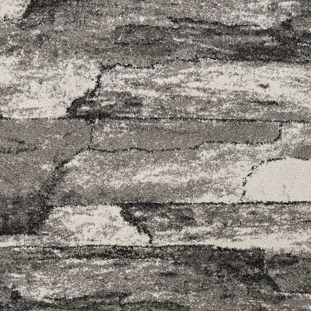 Gray abstract area rug, 8' x 11'.