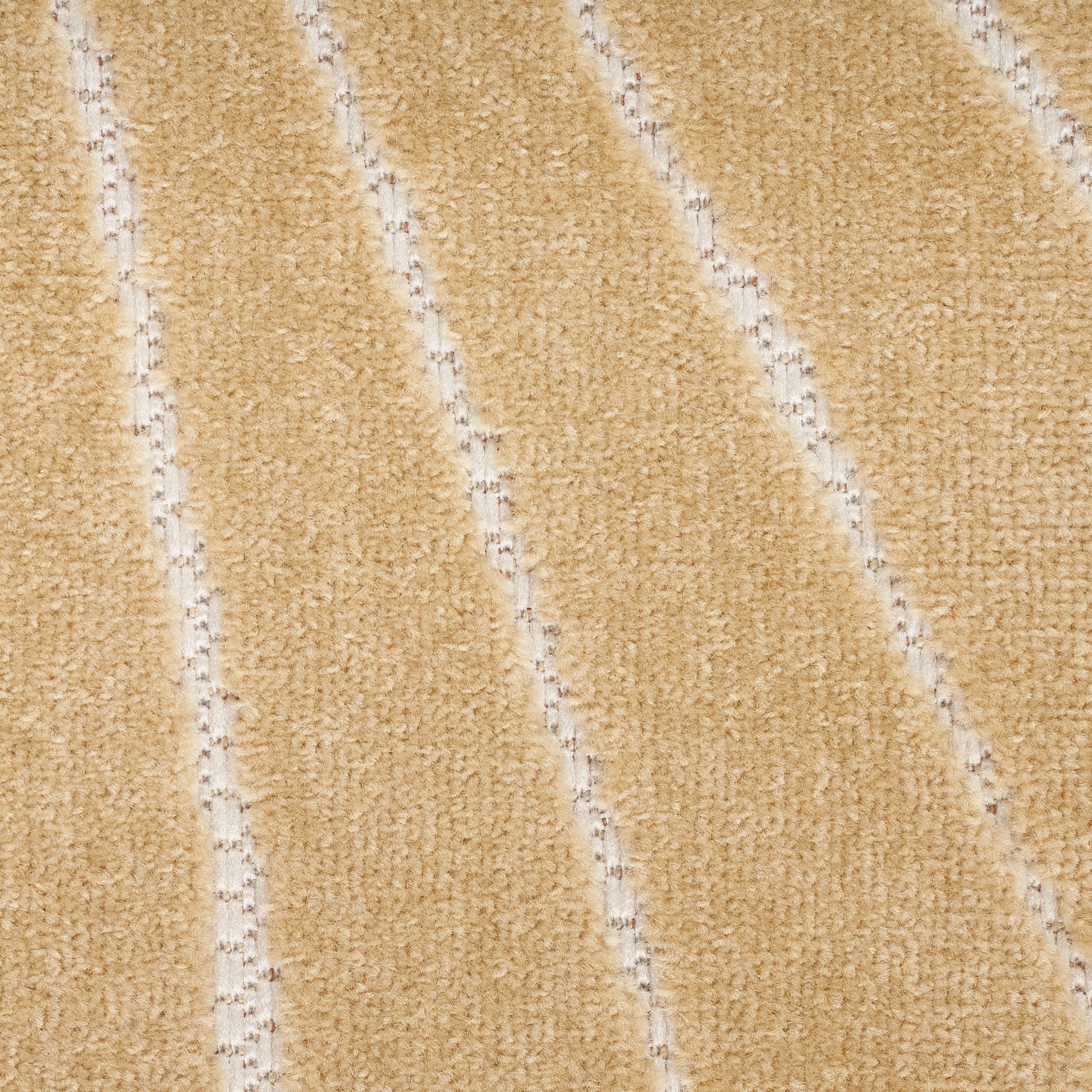 Beige textured outdoor rug with diagonal white stripes and plush, soft pile, 9' x 12'.