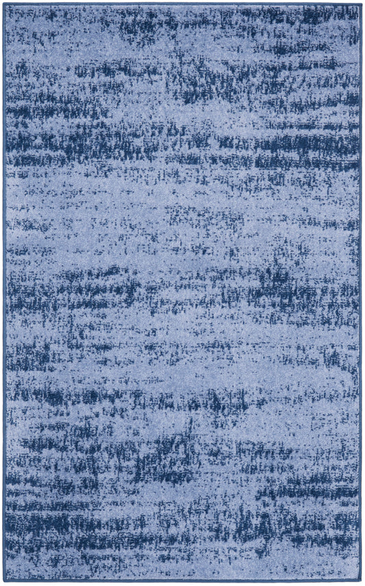 Rectangular blue rug with an abstract distressed pattern and dark border; soft-pile, modern decor.