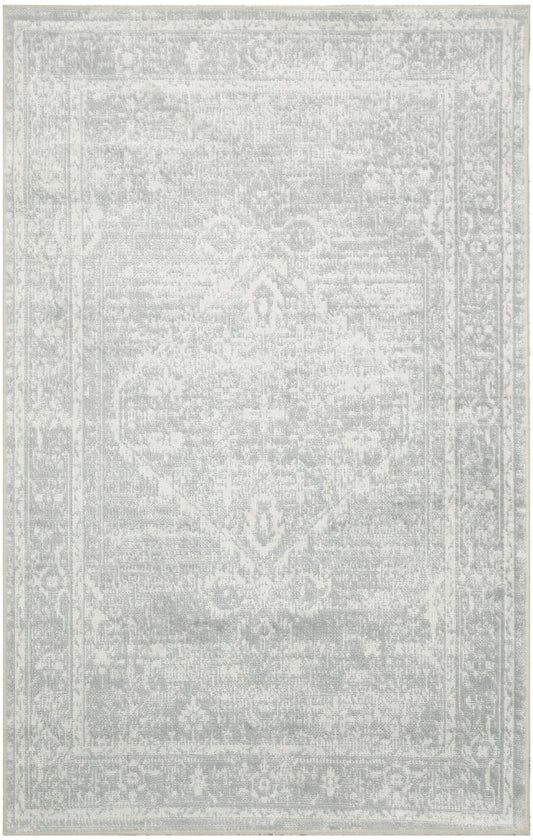 Light gray distressed rug with subtle Persian-inspired medallion and ornate border in vintage faded tones.