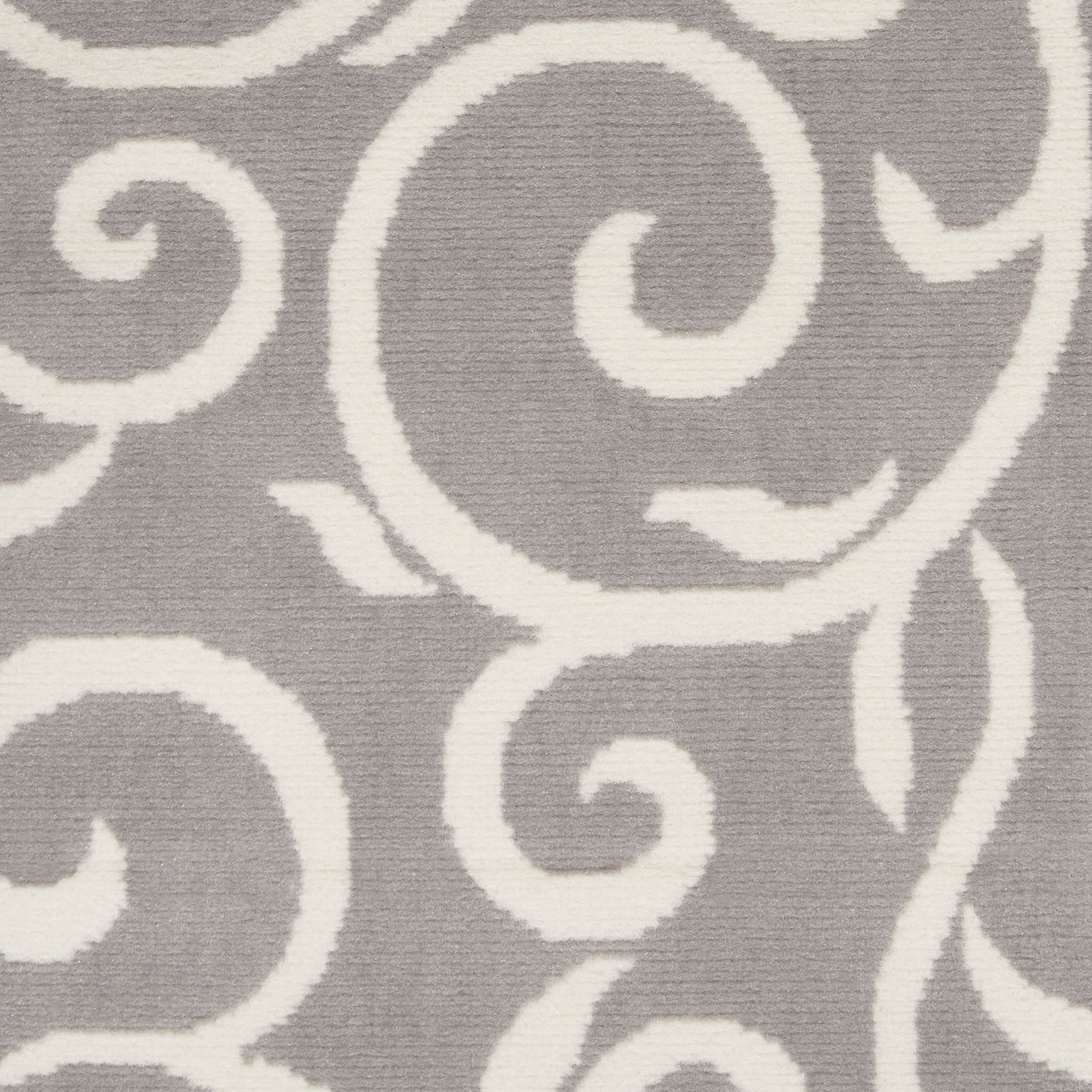 Gray area rug with white scrolling damask pattern; plush texture, modern classic decor for living spaces.