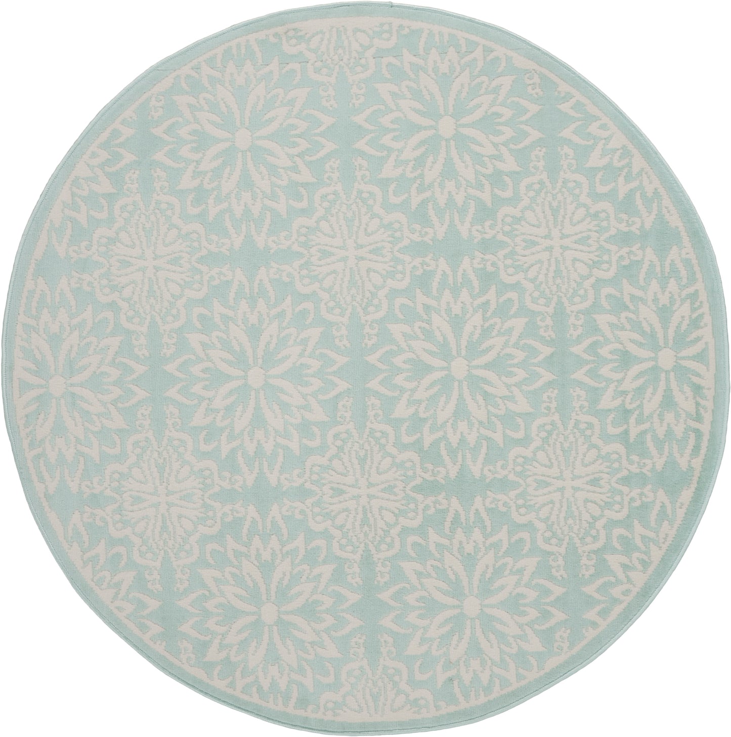 Round aqua rug with white intricate snowflake-mandala pattern and pale border.