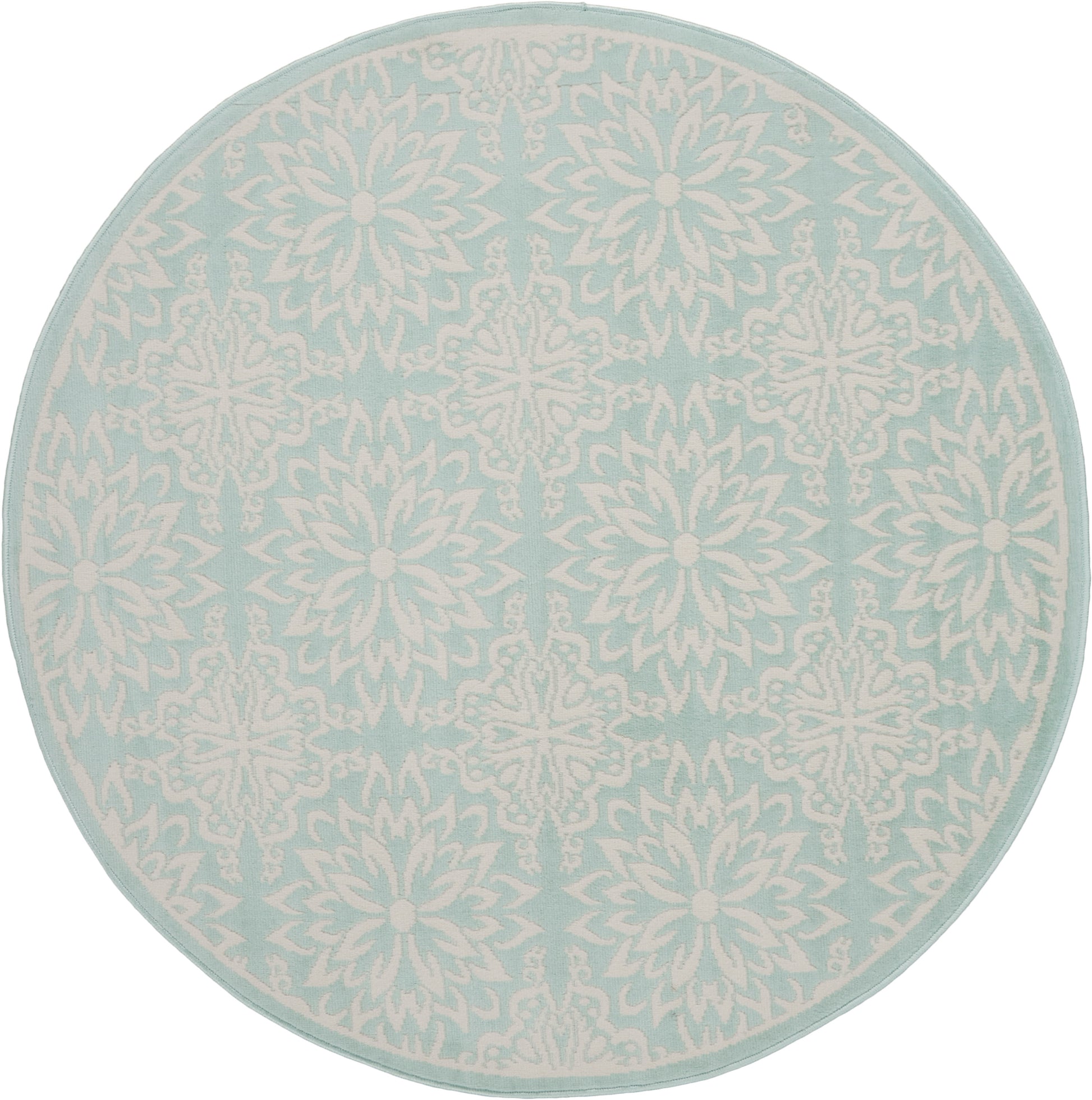 Round aqua rug with white intricate snowflake-mandala pattern and pale border.