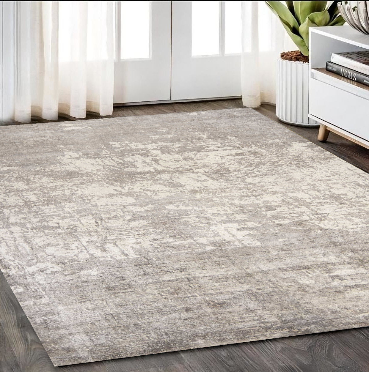 8' X 11' Beige And Ivory Abstract Hand Loomed Area Rug