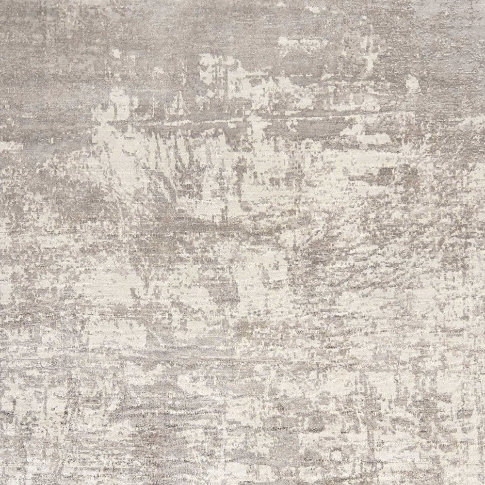 5' X 7' Beige And Ivory Abstract Hand Loomed Area Rug