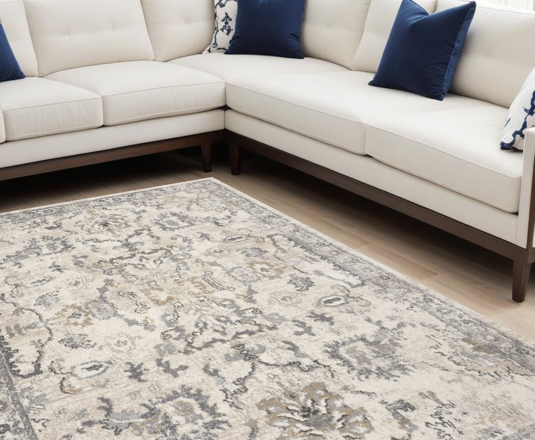 8' X 10' Ivory Machine Woven Distressed Floral Traditional Indoor Area Rug