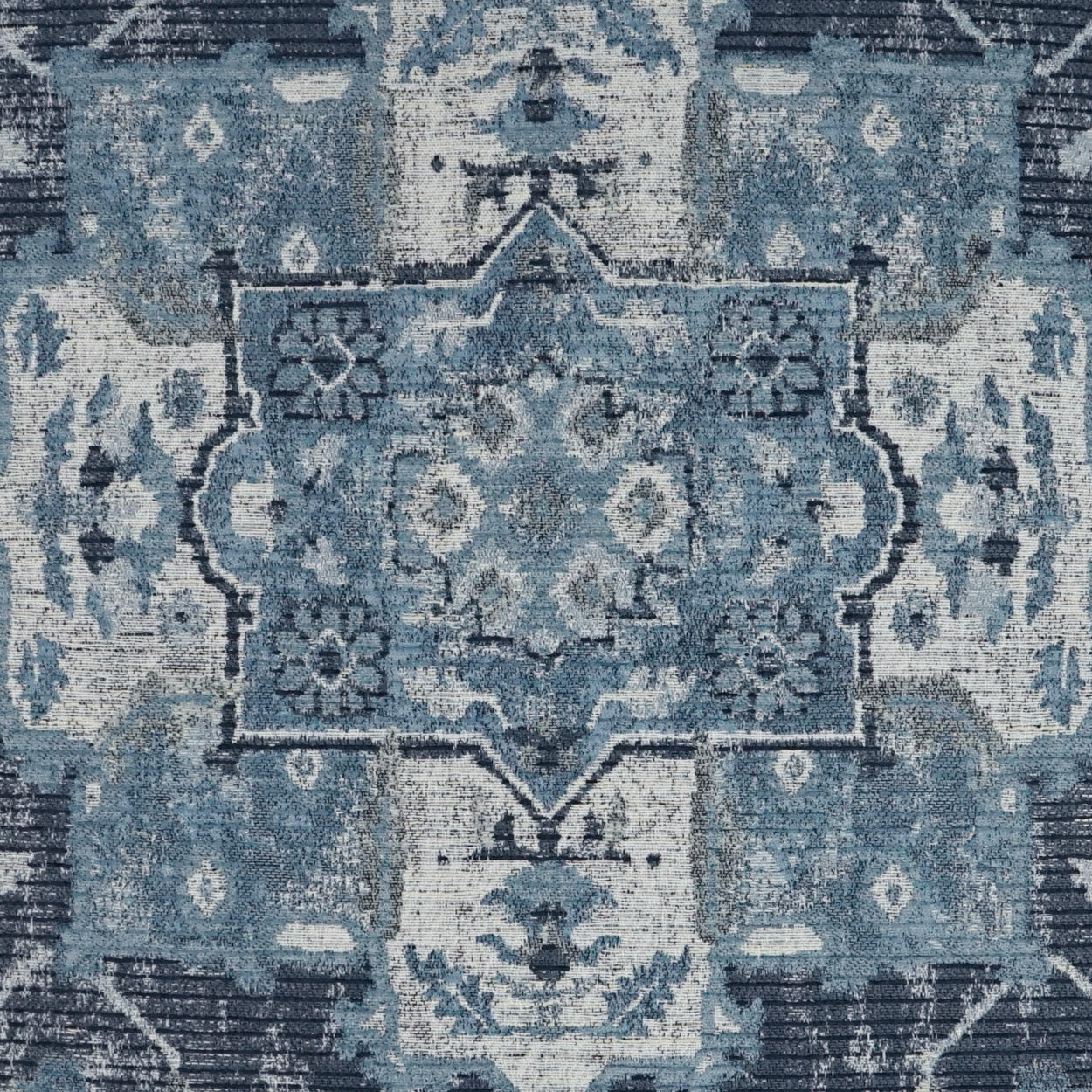Blue distressed oriental pillow with a central medallion and floral motifs, 24" x 24