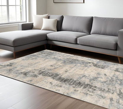 5' X 8' Ivory And Blue Abstract Area Rug