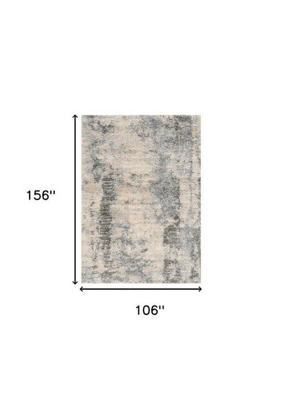 5' X 8' Ivory And Blue Abstract Area Rug