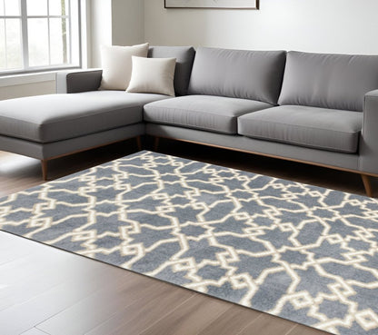 5' X 8' Slate Blue And Ivory Geometric Area Rug