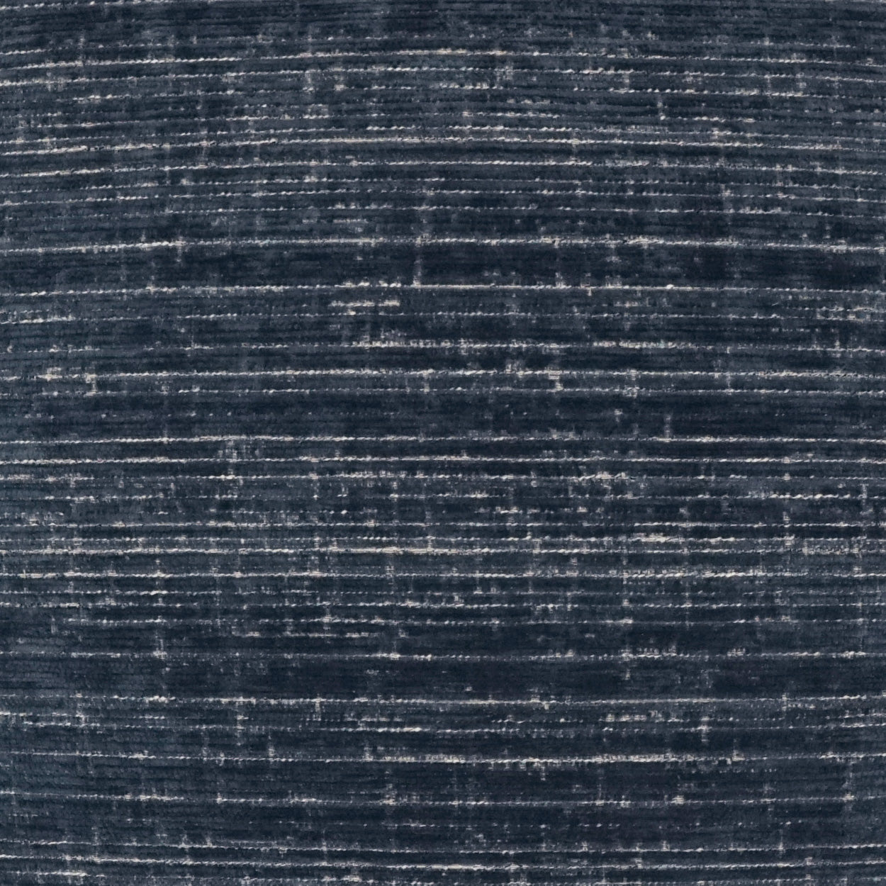 Navy blue woven fabric with subtle light horizontal streaks; textured upholstery or drapery material.
