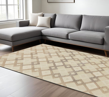 5' X 8' Ivory And Brown Wool Geometric Hand Tufted Area Rug