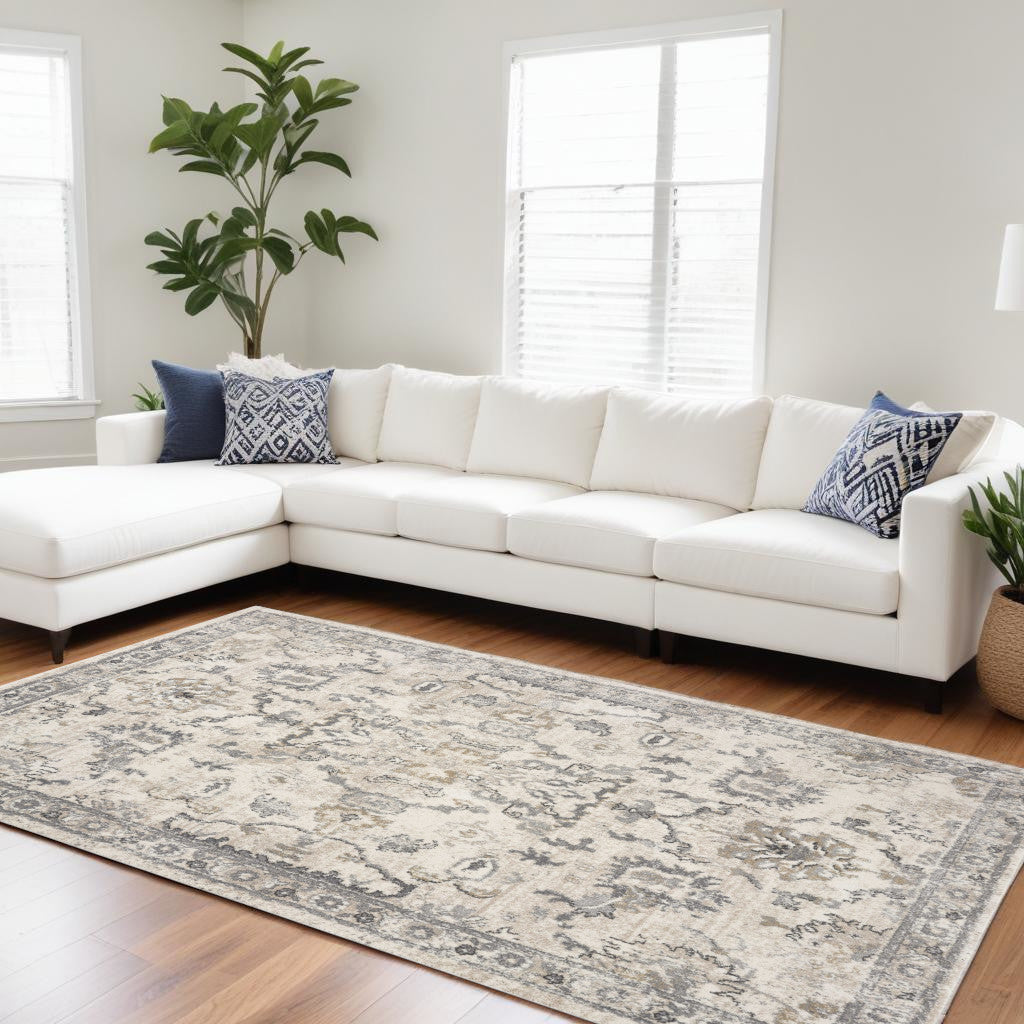 8' X 10' Ivory Machine Woven Distressed Floral Traditional Indoor Area Rug