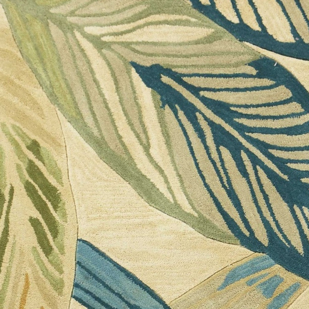 8' X 10' Ivory Teal Hand Tufted Tropical Leaves Indoor Area Rug