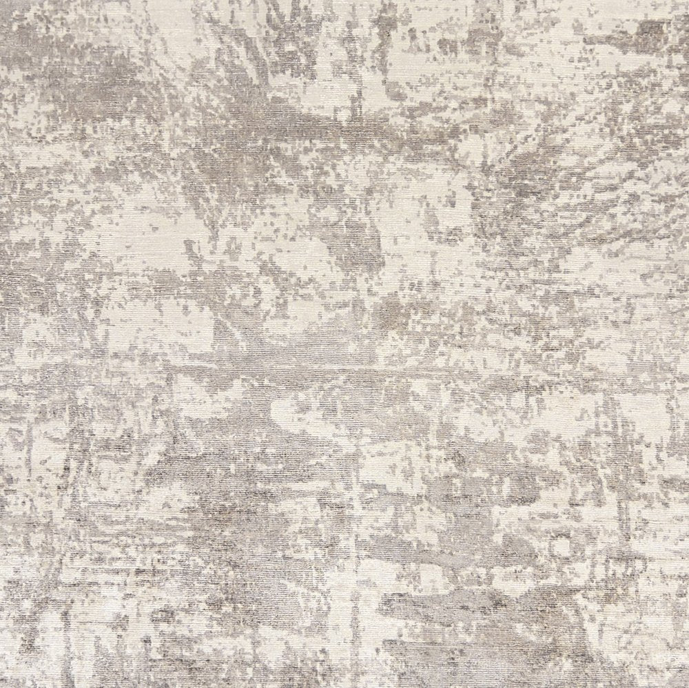 5' X 7' Beige And Ivory Abstract Hand Loomed Area Rug