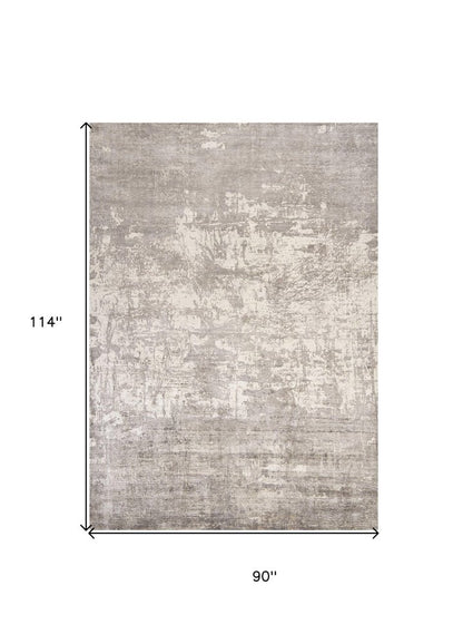8' X 11' Beige And Ivory Abstract Hand Loomed Area Rug