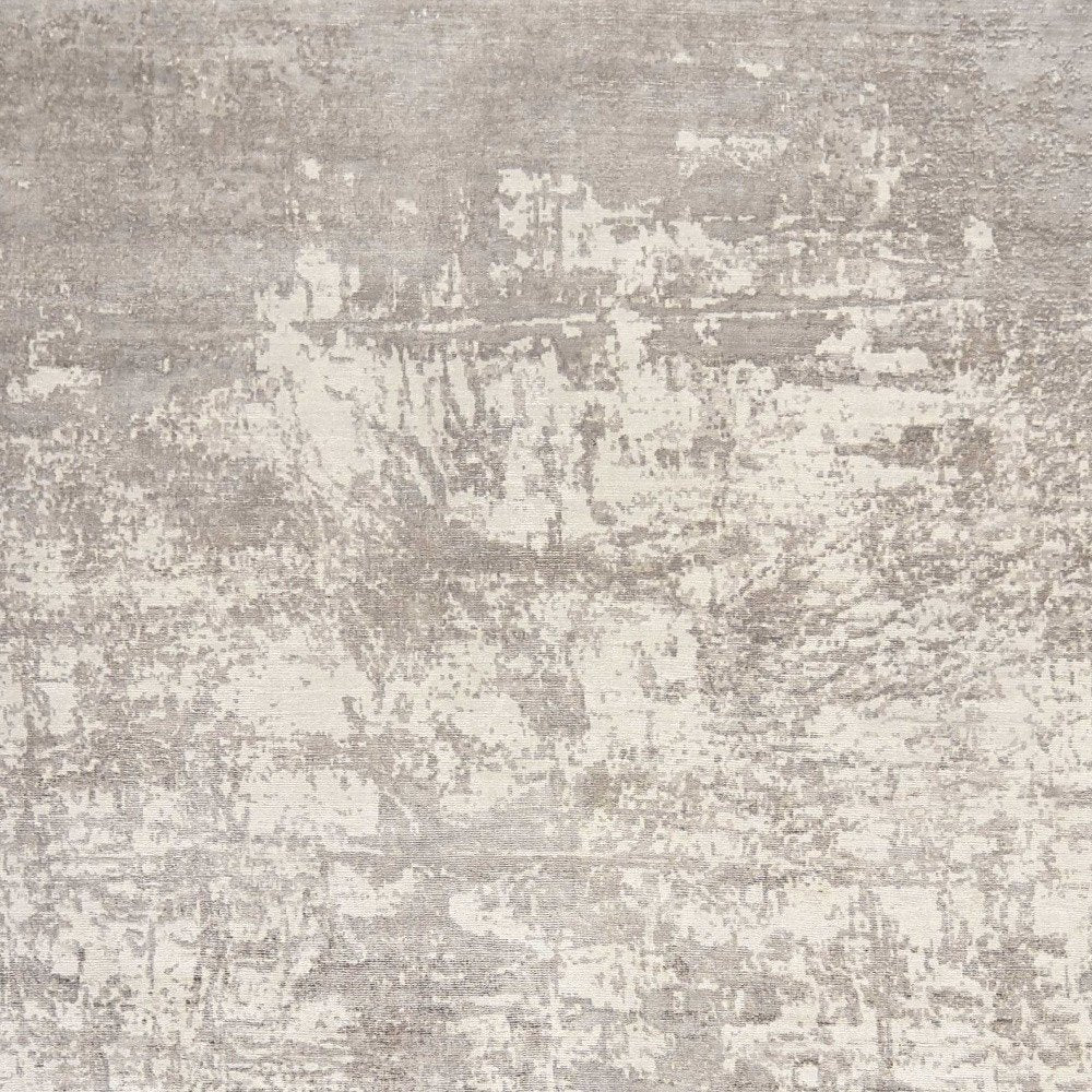 8' X 11' Beige And Ivory Abstract Hand Loomed Area Rug