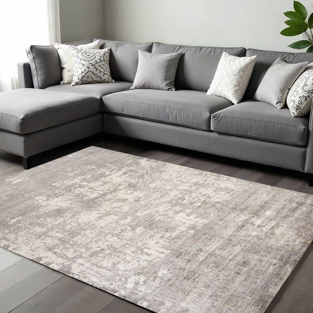 8' X 11' Beige And Ivory Abstract Hand Loomed Area Rug