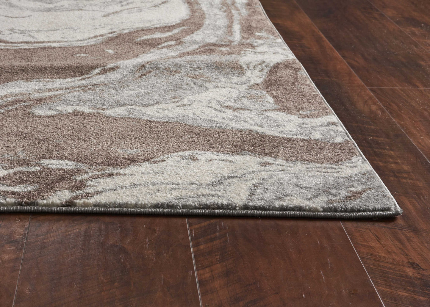 7' X 10' Brown And Ivory Abstract Area Rug