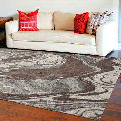 7' X 10' Brown And Ivory Abstract Area Rug