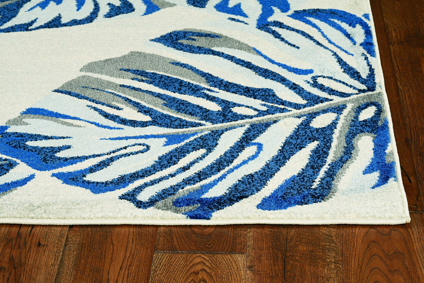 8' X 11' Grey Blue Machine Woven Oversized Tropical Leaves Indoor Area Rug