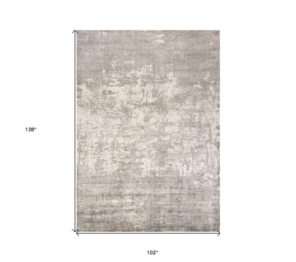 8' X 11' Beige And Ivory Abstract Hand Loomed Area Rug