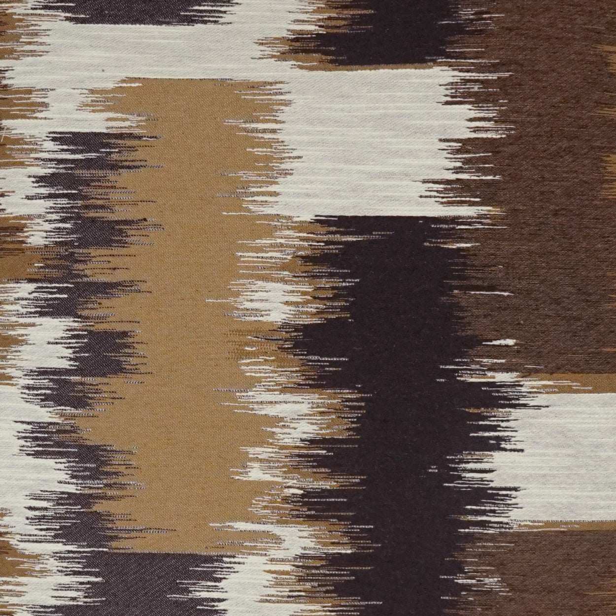 Abstract brushstroke patterned fabric in earthy tan, cream, brown and black tones.