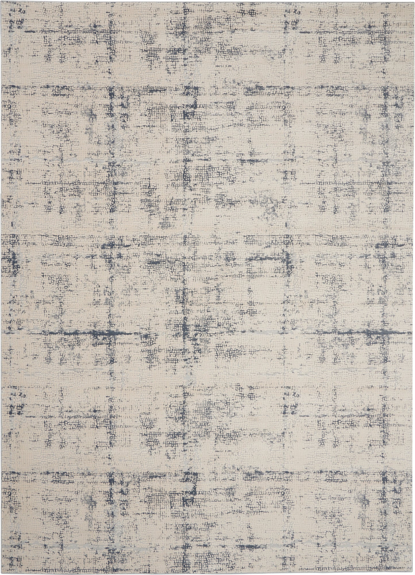 Beige abstract rug with distressed navy-gray grid pattern and soft worn texture