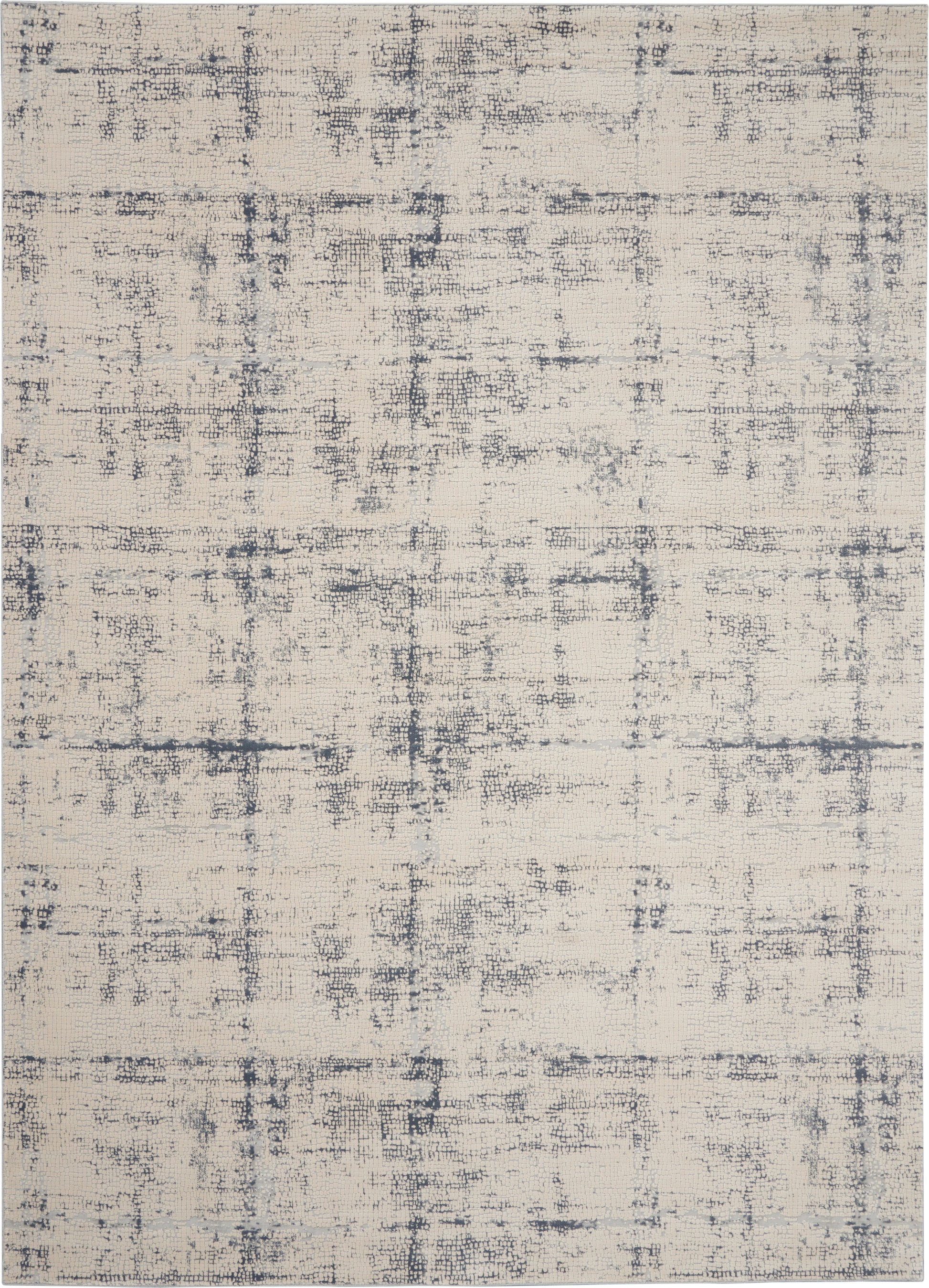 Beige abstract rug with distressed navy-gray grid pattern and soft worn texture