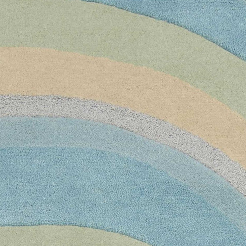 5' X 8' Blue Beige And Green Wool Abstract Hand Tufted Area Rug