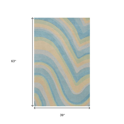 5' X 8' Blue Beige And Green Wool Abstract Hand Tufted Area Rug