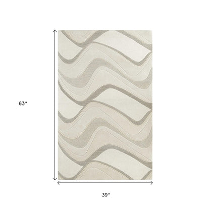 2' X 4' Ivory And Gray Wool Abstract Hand Tufted Area Rug