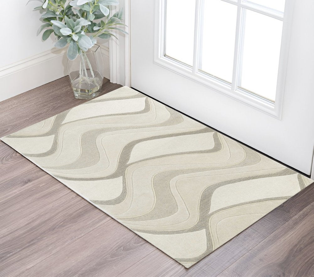 2' X 4' Ivory And Gray Wool Abstract Hand Tufted Area Rug