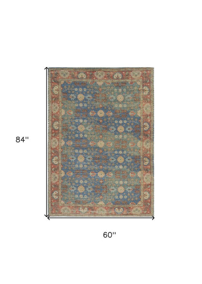 5' X 7' Blue Red And Beige Floral Medallion Hand Woven Distressed Area Rug