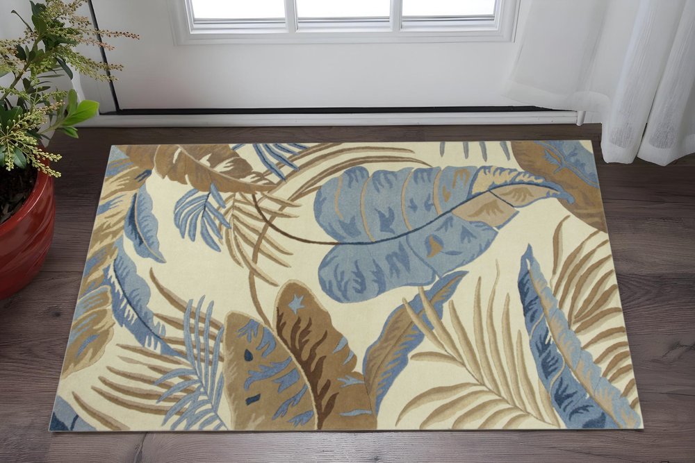 5' X 8' Ivory Blue And Brown Wool Tropical Botanical Hand Tufted Area Rug