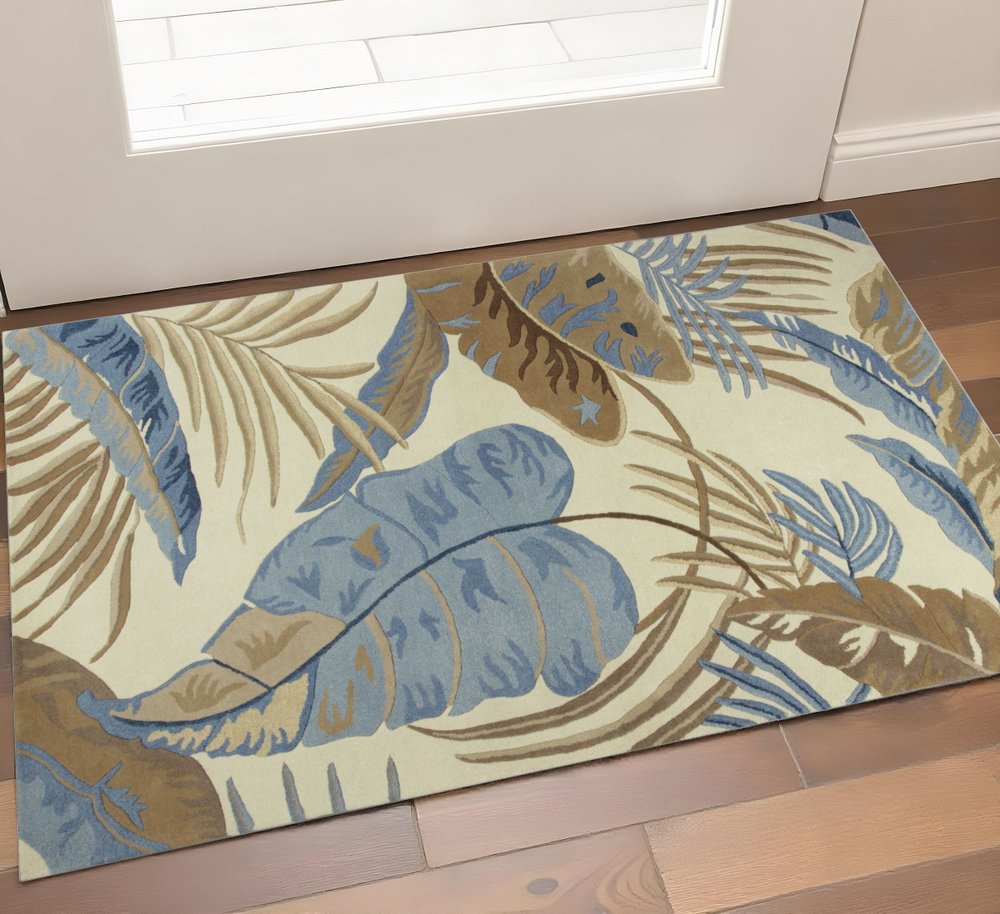 5' X 8' Ivory Blue And Brown Wool Tropical Botanical Hand Tufted Area Rug