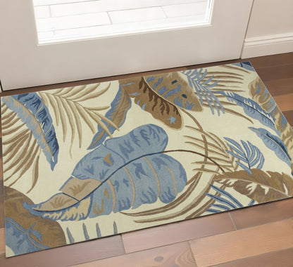 5' X 8' Ivory Blue And Brown Wool Tropical Botanical Hand Tufted Area Rug