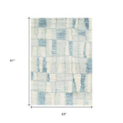 7' X 9' Ivory and Blue Area Rug