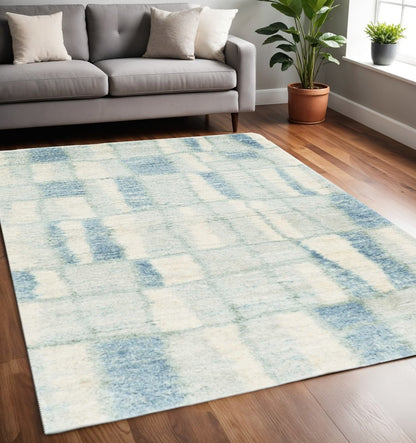 7' X 9' Ivory and Blue Area Rug