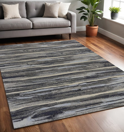5' X 8' Gray Blue And Black Abstract Area Rug